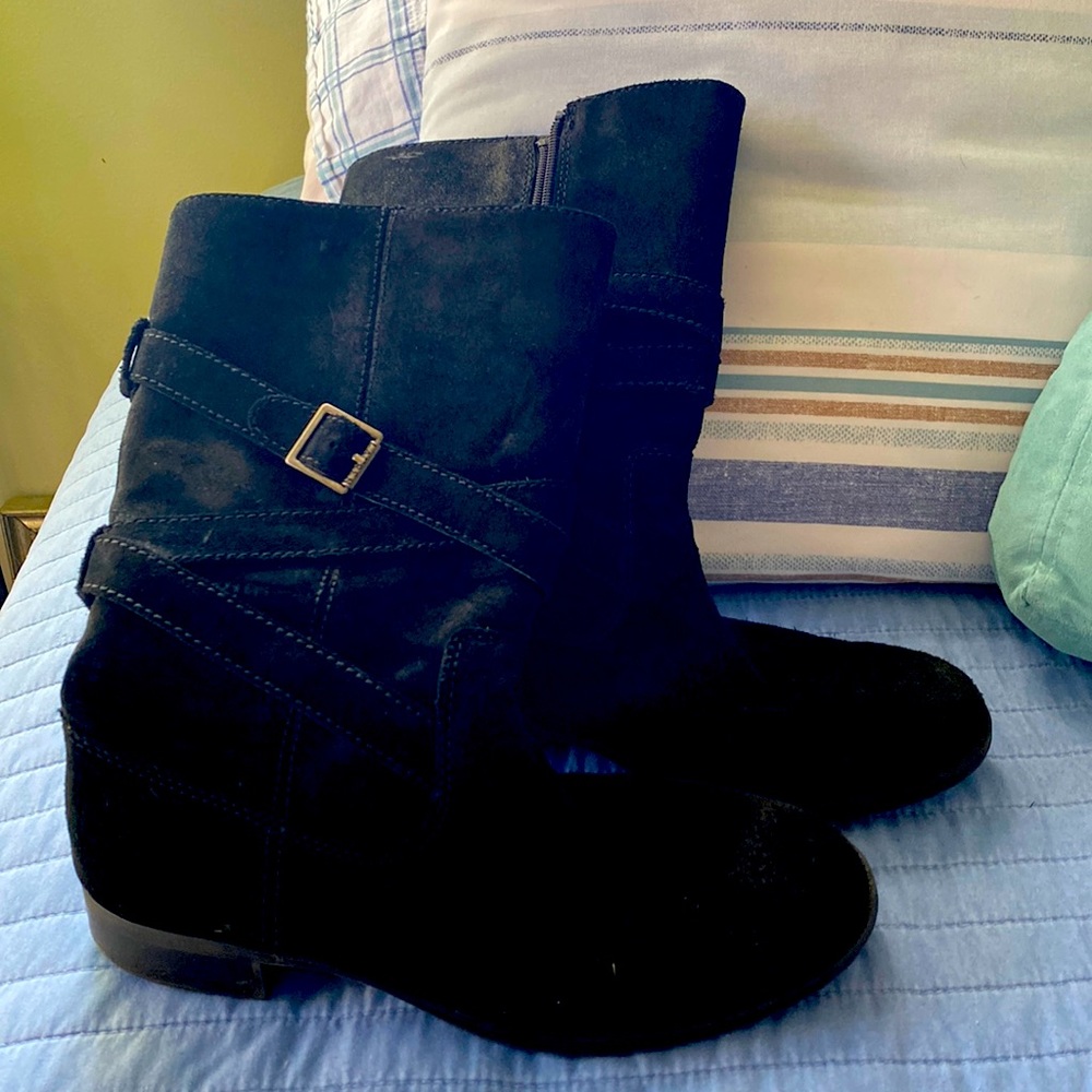 Mid calf suede boots.